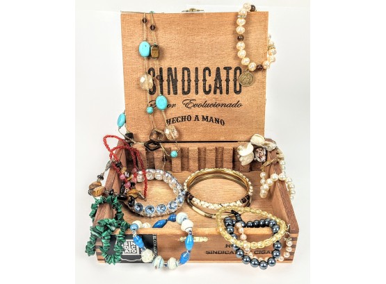 Eye-Catching Charm Bracelets In A Crafted Wooden Sindicato Cigar Box