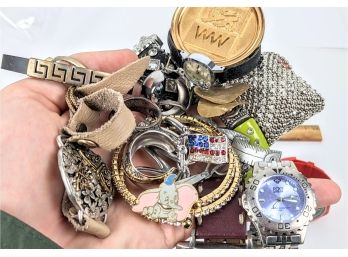 Handful Of Colorful And Unique Costume Jewelry Featuring Watches, Bracelets, And Pins