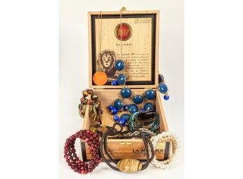 Fashion Charm Necklaces In A Wooden La Aurora Cigar Box