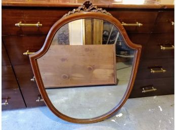 Vintage Mohagany Mirror With Carved Design At The Top