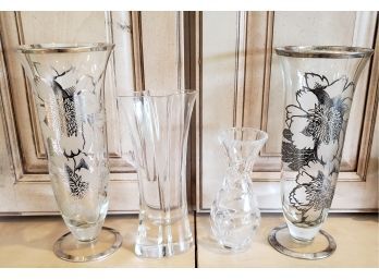 Pair Of Silver Floral Designed Vases And Two Other Small Glass Vases