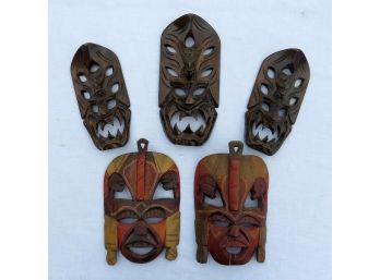 A Grouping Of Hand Carved Tribal Masks From Kenya & The Philippines