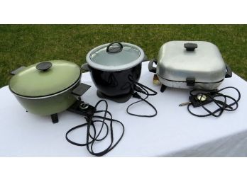A Trio Of Older Electric  Pans