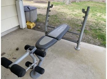 A Reebok 125 AXB Work Out Bench With A Duck Cover Included