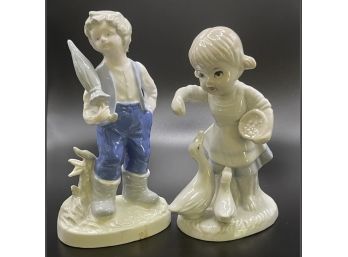 Boy & Girl Porcelain Figurines
