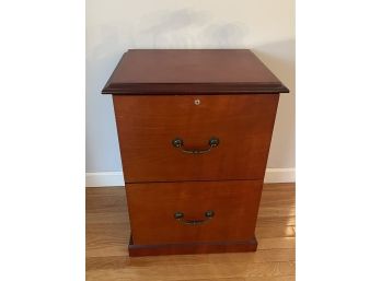 A Two Drawer Wood Filing Cabinet
