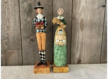 A Man & Woman Pilgrim Figurines