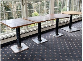A Group Of 4 Cafe Tables With Square Bases