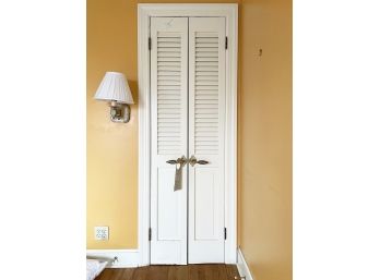 A Pair Of Louvered Doors With Elegant Brass Hardware - 118