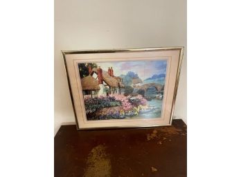 Framed Art Of A Cottage By The Lake
