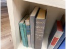 A Collection Of Hard Covered Books Shades Of Blue