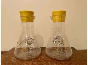 Two Vintage Pyrex Atomic Sunburst Glass Juice Pitchers