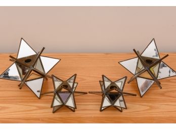Set Of Four Three Dimensional Mirrored Star Candlestick Holders