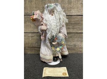 A Collectible Porcelain Christmas Romance Santa Doll With Certificate Of Authenticity And Original Box