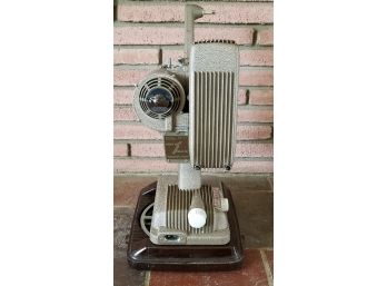 Revere Camera Company Model 45 16mm Projector With Reel And Case.