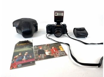 CANON T50 With Flash Case And Original Books