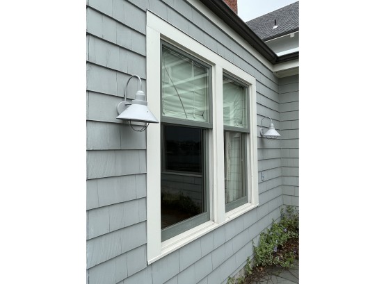 A Pair Of Metal Barn Style Lights In Gray