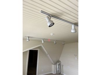 A Pair Of White Track Lighting With Four Heads Each - Attic A