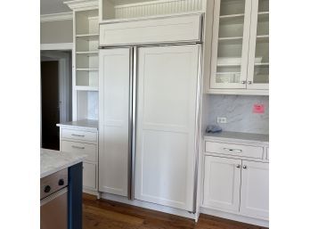 A Duo Of White Cabinets - Uppers And Lowers - Marble Counter And Back Splash - Fridge Wall