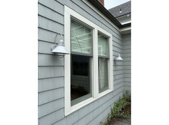 A Pair Of Metal Barn Style Lights In Gray