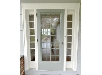 An Exterior 28 Lite Wood Entrance Door And Doorway With Sidelights