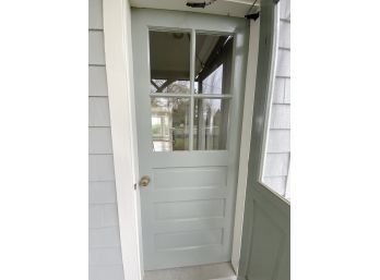 An Exterior 4 Lite Wood Door