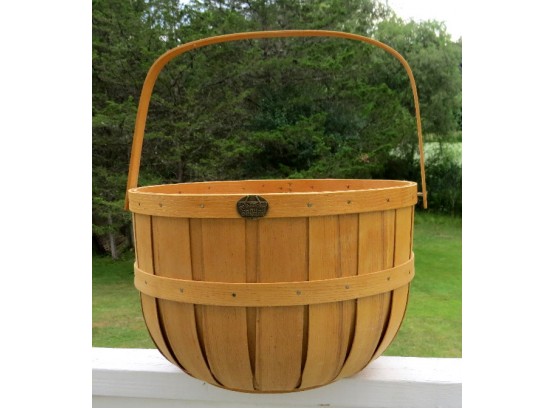 An Awesome Large Round PETERBORO Gathering Basket With Swing Handle
