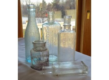 A Grouping Of  Embossed Medicine Bottles - Lot B