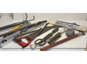 Tool Lot #2 Including Tool Bars, Levels, Various Pliers, Squares, And Saw
