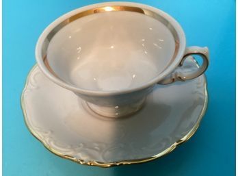 Vintage White Embossed TeaCup And Saucer Set