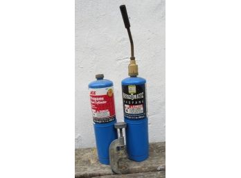 Propane Torch, Used Tanks And A Pipe Cutter