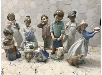 8 Collectable NAO LLADRO Figurines