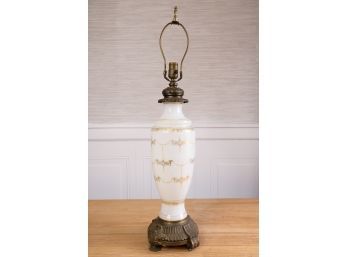 French Neoclassical Style Porcelain And Brass Table Lamp With Gold Leaf Swag Design