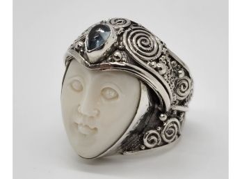 Carved Bone, Sky Blue Topaz Ring In Sterling Silver