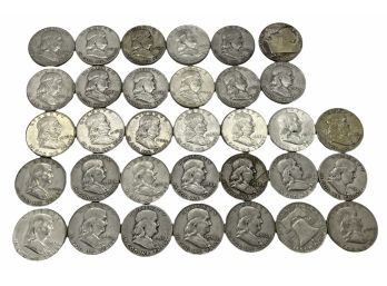 Thirty Three Franklin US Silver Half Dollars (A)