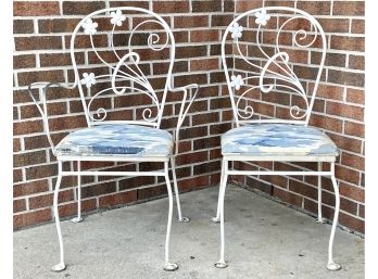 A Pair Of Vintage Wrought Iron Patio Chairs