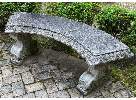 A Cast Concrete Curved Outdoor Bench
