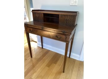 An Old Maddox Colonial Reproduction Secretary Desk
