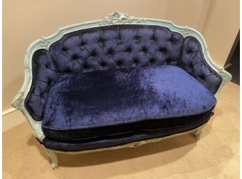 An Antique Tufted Navy Blue Wood Frame Ornate Settee