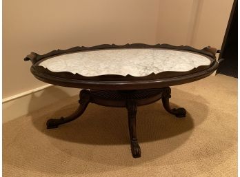 A Vintage Marble Top Mahogany Oval Coffee Table
