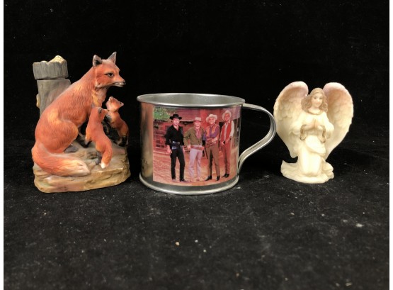 Angel And Fox Figures With A Cowboy Mug