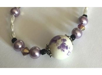 Necklace With Purples And White Balls
