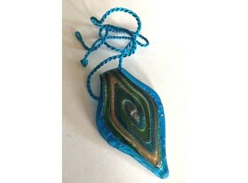 Hand Blown Glass Pendant In Blue On Rope