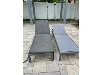 Two Chaise Lounges With Cushions