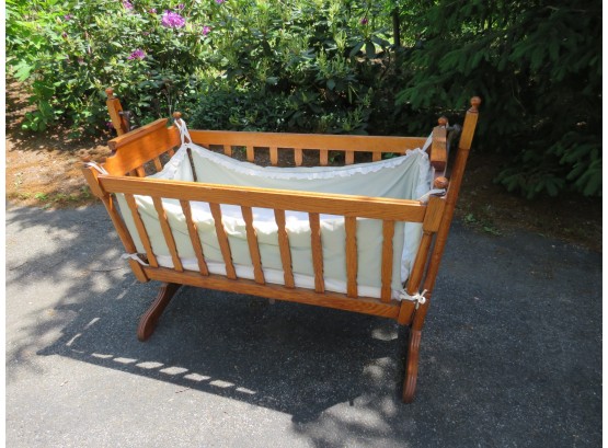 Baby Rocking Crib With Wrought Iron Accents