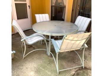 Patio Table And 4 Swivel/Rock Arm Chairs