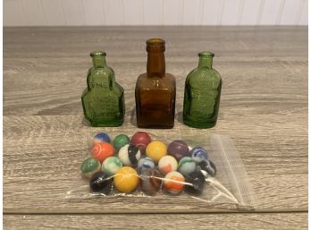 3 Tiny Glass Bottles And Old Marbles