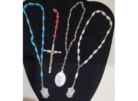 Lot Of Rosary Beads With All Different Charms