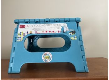 A Turquoise 9 Inch Folding Step Stool