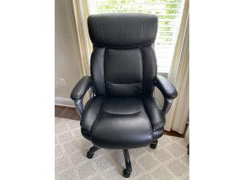 A Black Swivel & Adjustable Height Office Chair